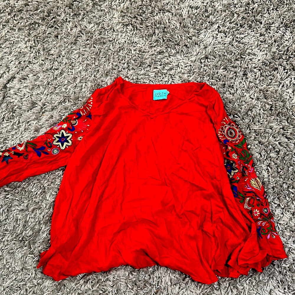 Judith March Top with embroidered detail on sleeves. Bell sleeves